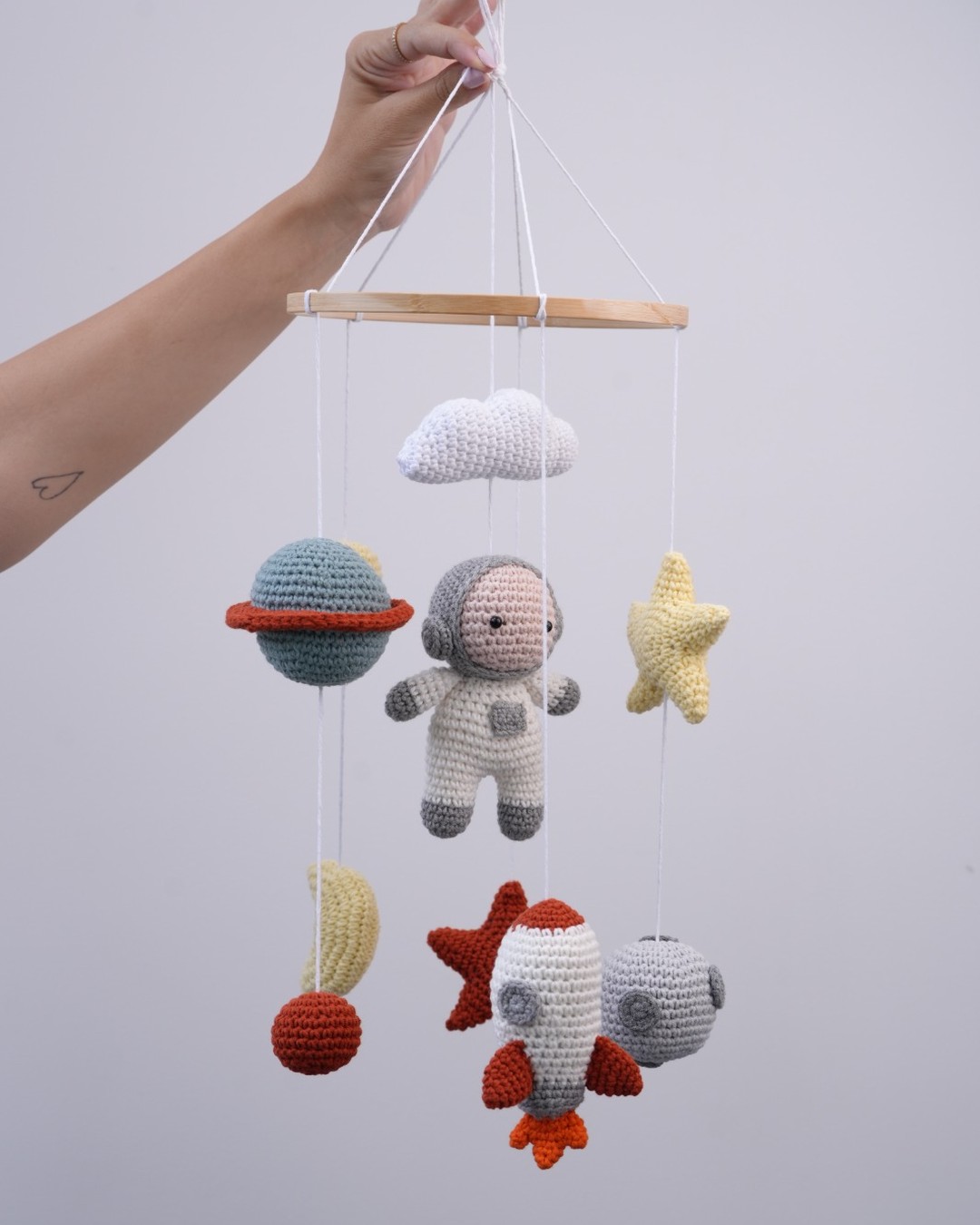 Handmade crochet Little Astronaut crib mobile with astronaut, rocket, planets and stars