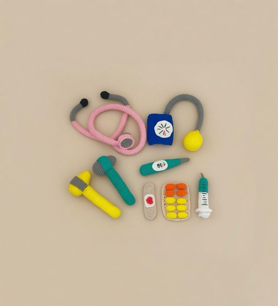 Handmade crochet doctor kit with stethoscope, cuff, thermometer, syringe and more