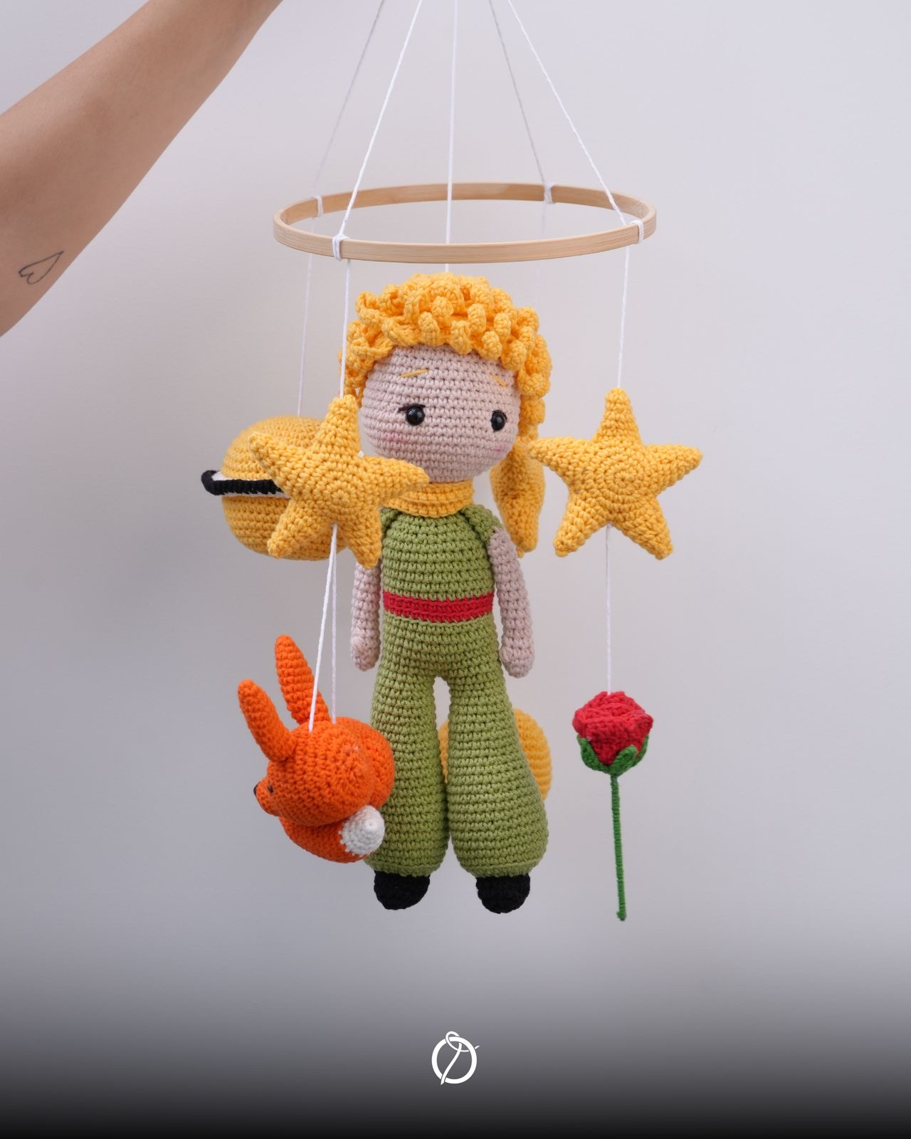 Crochet Little Prince nursery mobile with rose, fox, stars and planet on a wooden hoop