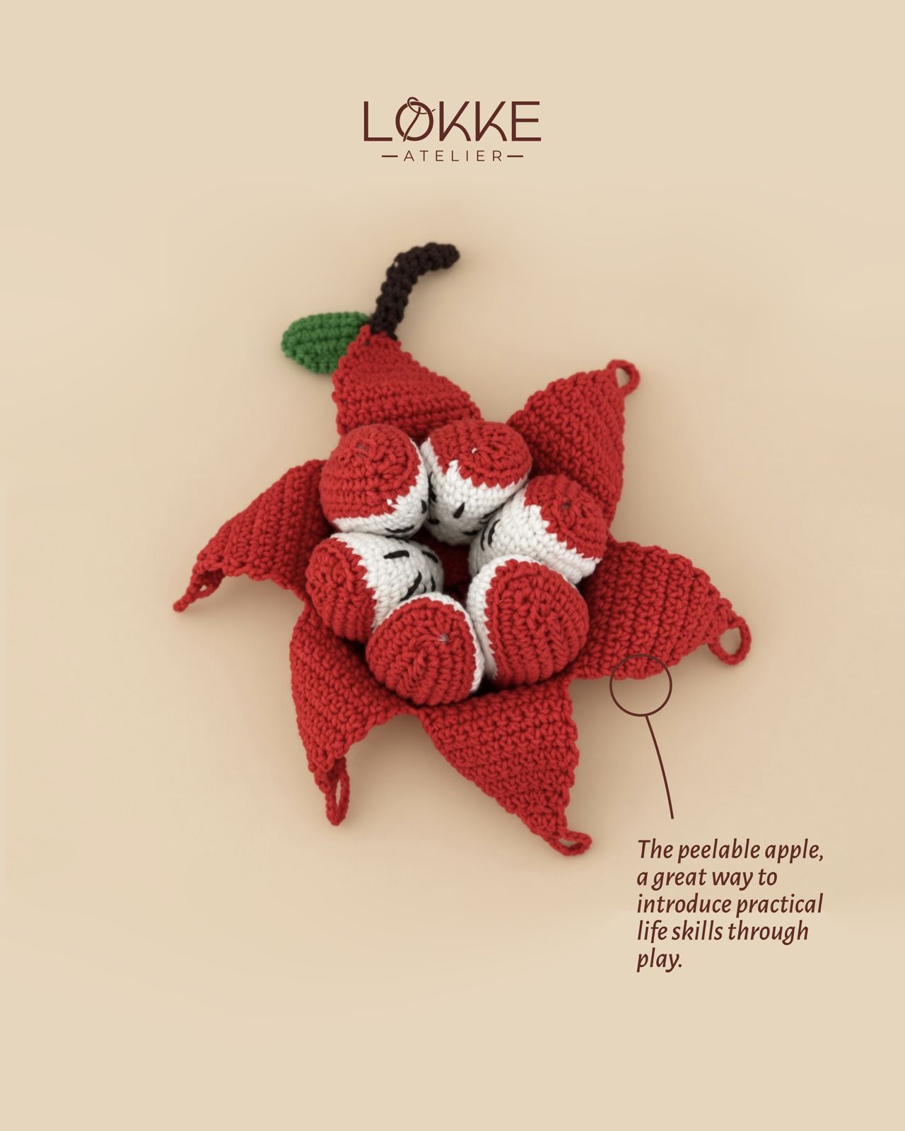 Handmade peelable crochet apple opened to show white wedges