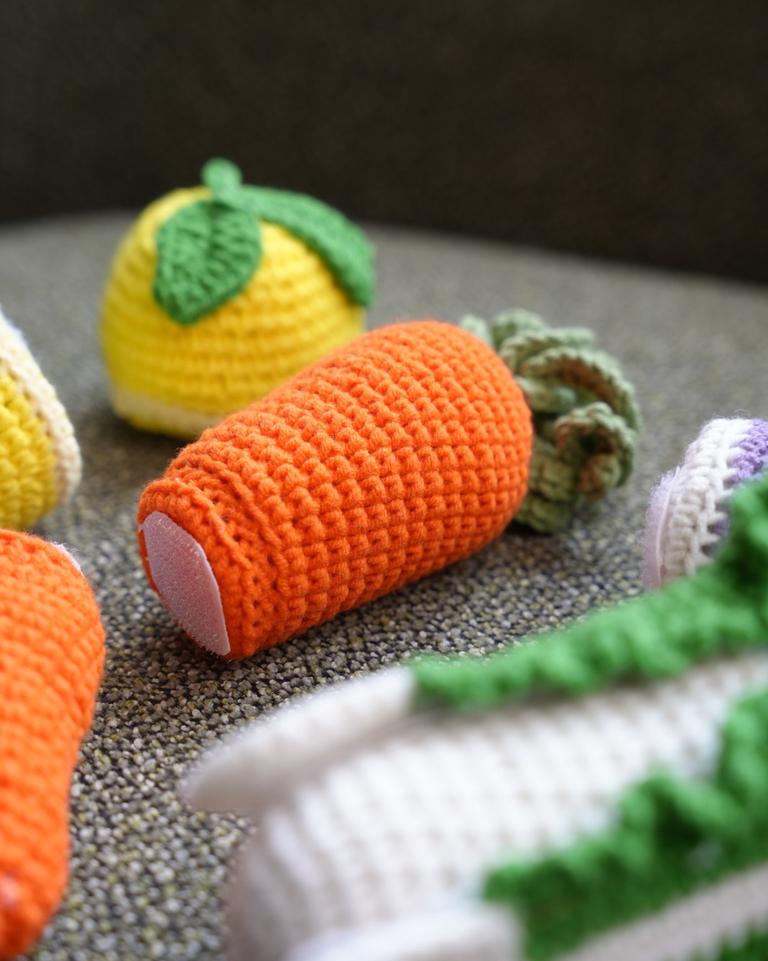 Close-up of crochet carrot half with Velcro for cut-and-play